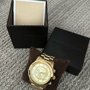 Michael Kors oversized multi-function watch.